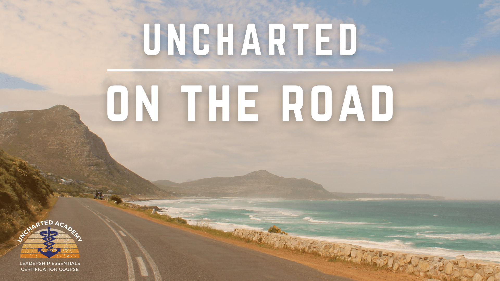 photo of a road next to the ocean with text Uncharted On The Road
